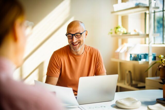 small-office man orange shirt